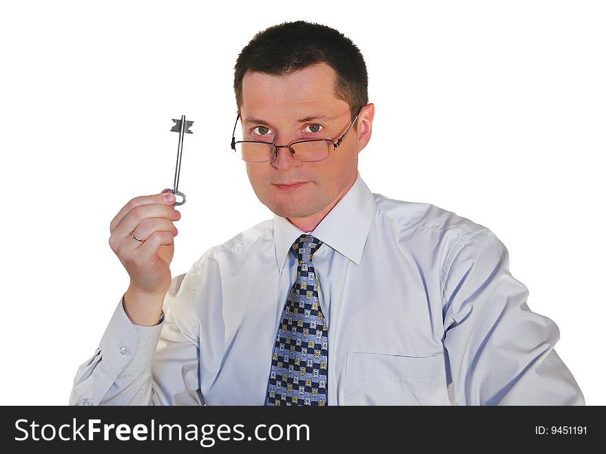 Portrait of man in glasses with a toy key. Portrait of man in glasses with a toy key