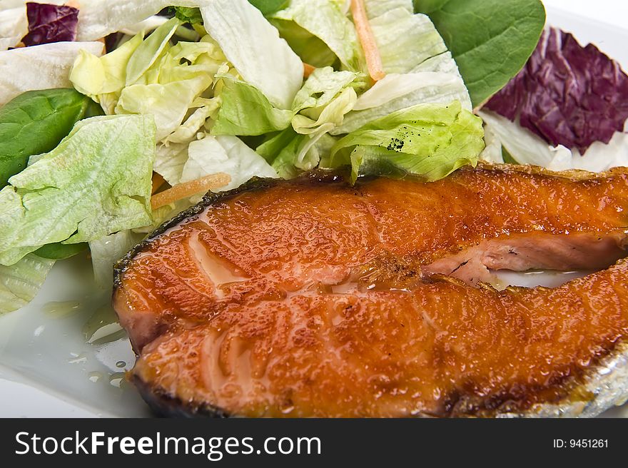 Salmon steak with fresh salad. Salmon steak with fresh salad