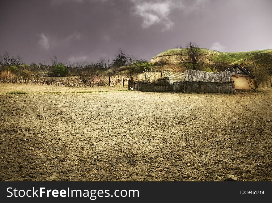 Peasant house at the country in field. Peasant house at the country in field