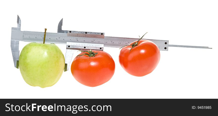 Trimmel with apple and tomato isolated on white. Clipping paths