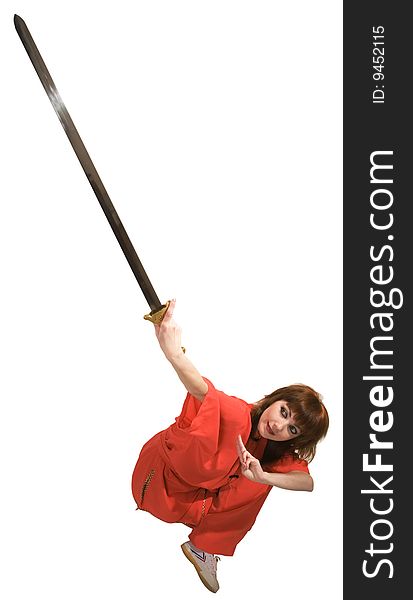 Young woman makes kung-fu exercise with sword isolated with clipping path on white background. Young woman makes kung-fu exercise with sword isolated with clipping path on white background