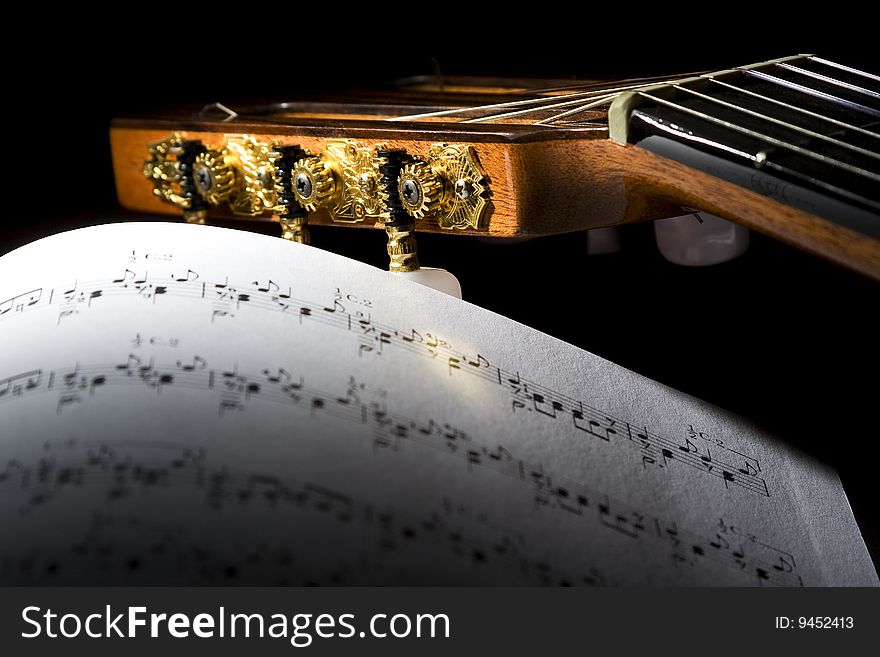 Closeup image of gold plated classical guitar tuners