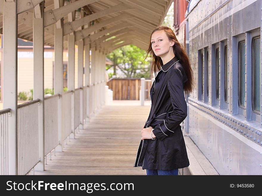 Woman Standing Next To Train