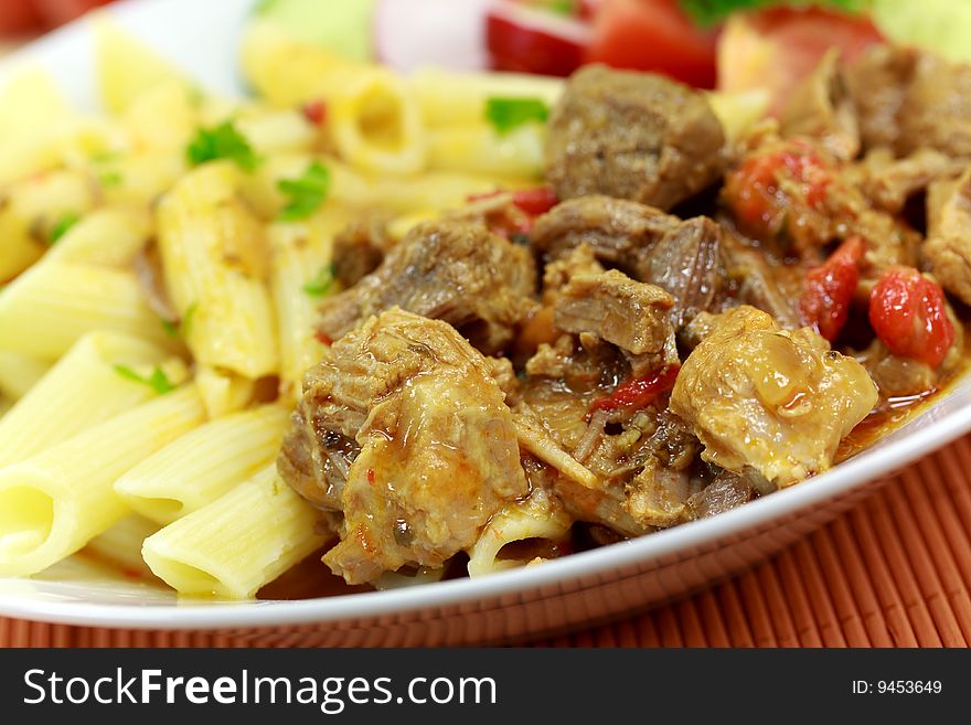 Goulash meat with penne noodles