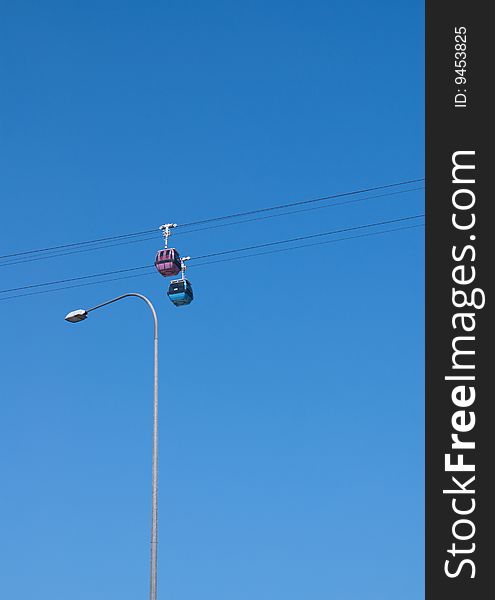 Cable car in operation against blue sky in singapore