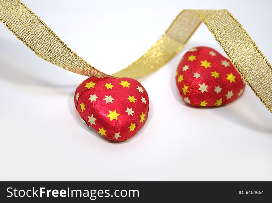 A pair of chocolate candy valentine hearts. A pair of chocolate candy valentine hearts
