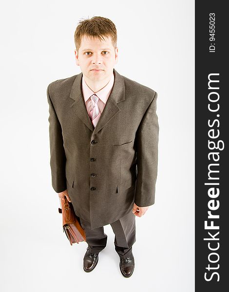 Young business man with bag on white bakcground