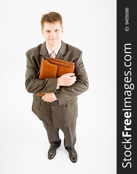 Young business man with bag on white bakcground