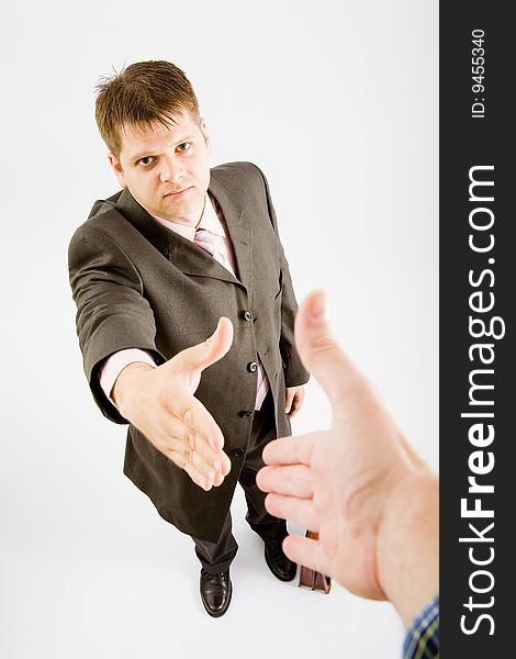 Business man handshake on white background