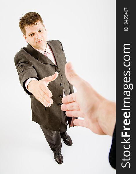 Business man handshake on white background