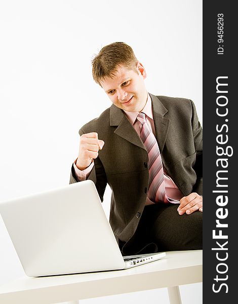 Young business man with laptop