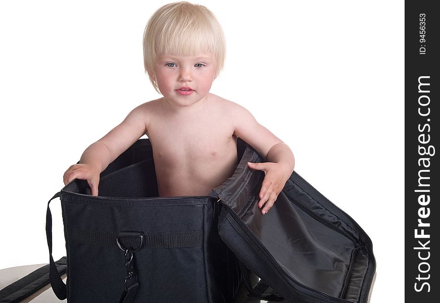 Cute child into large bag. Cute child into large bag