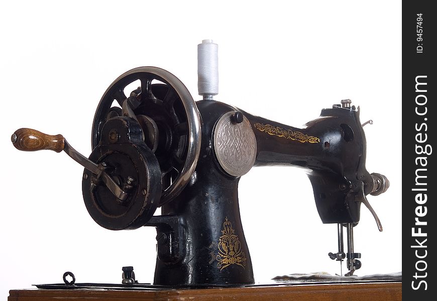 Sewing machine in white background