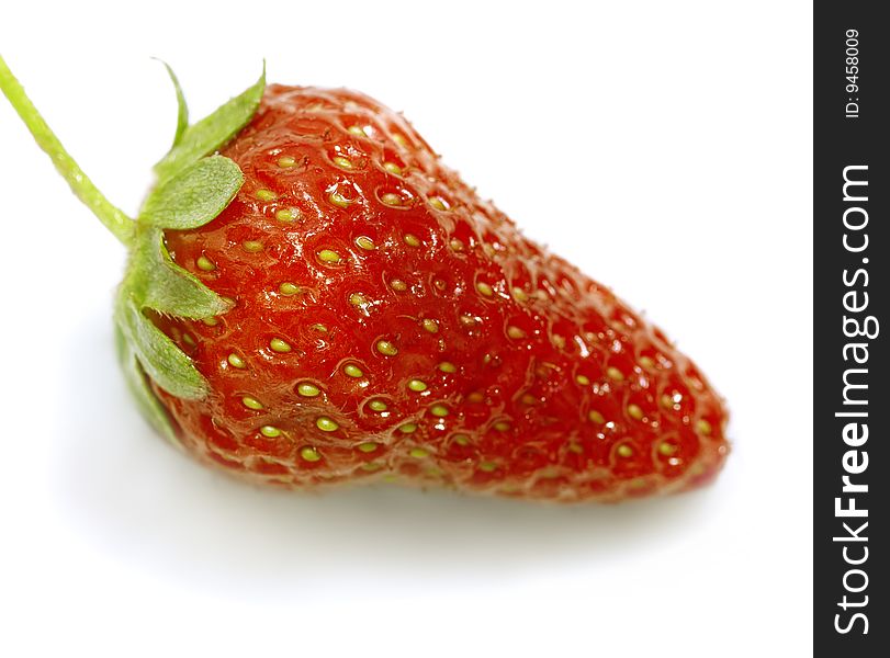 One berry of a ripe strawberry close up