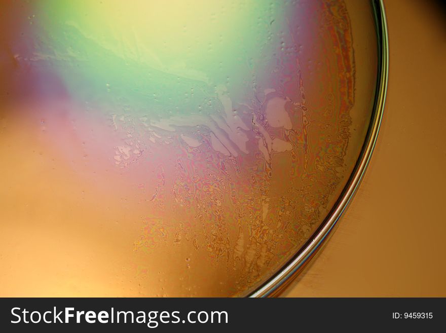 Soap bubble reflecting colorful light. Soap bubble reflecting colorful light