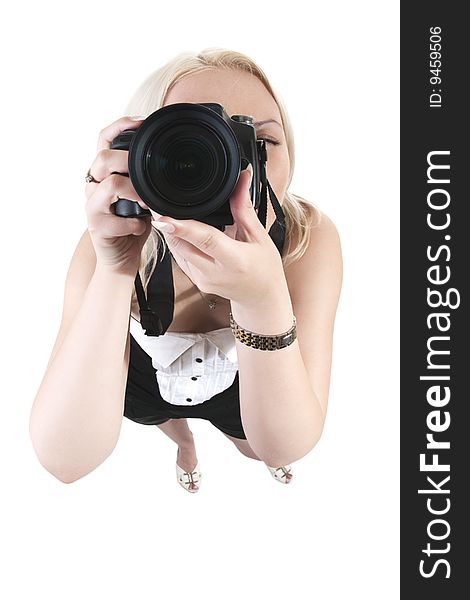 Girl with camera on white background