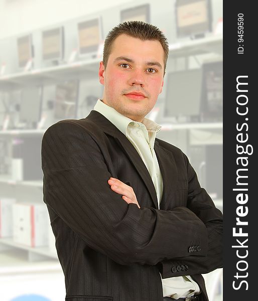 Businessman in front of an offices building.