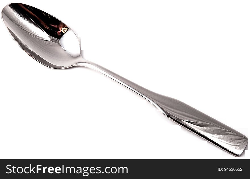 A spoon on a white background. A spoon on a white background.
