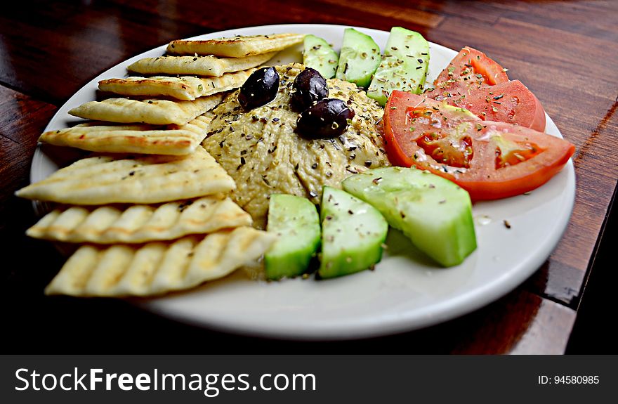 Sliced Tomato With Cucumber And Taco