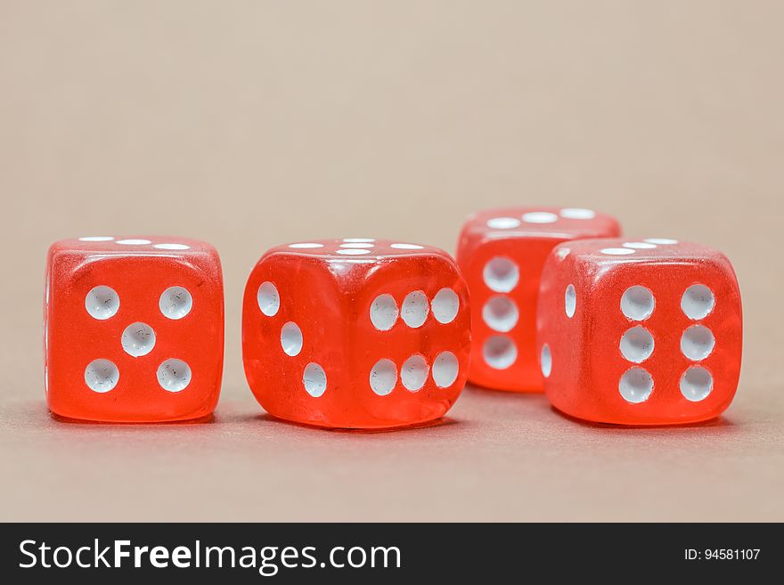 Close Up Photography of 4 Red White Dice