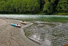 Two Kayaks Along River Bed Royalty Free Stock Images
