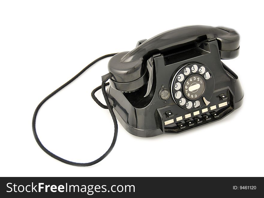 Old vintage telephone isolated in white background. Old vintage telephone isolated in white background
