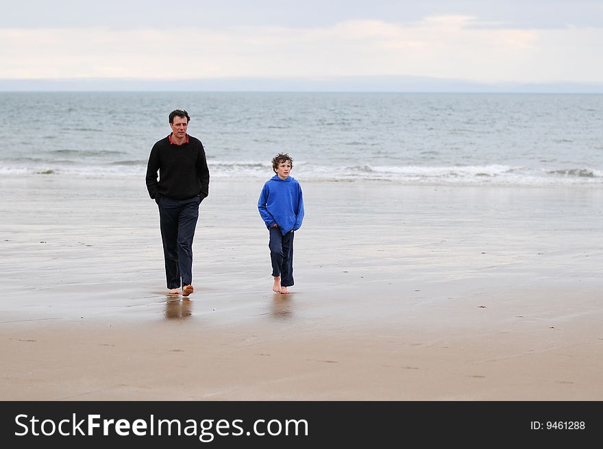 Portrait of father and son on beach. Portrait of father and son on beach