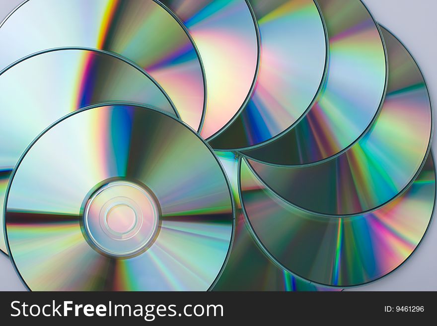 Multicolored CD disks close-up