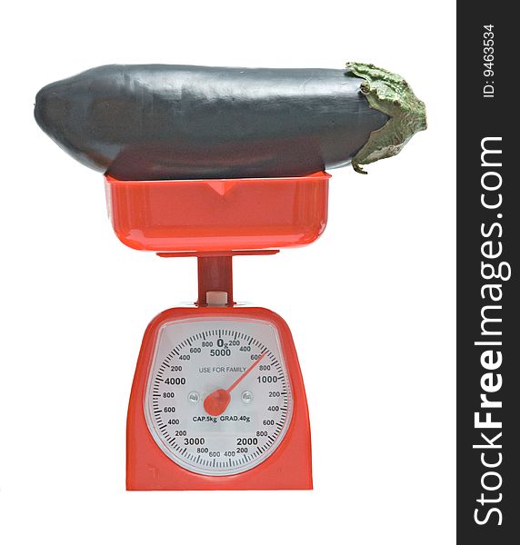 Kitchen scale weighting eggplant