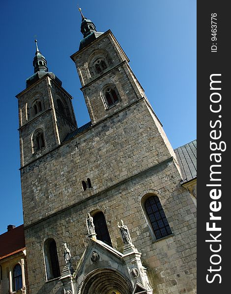 Stone tower of the Gothic monastery in Bohemia.
