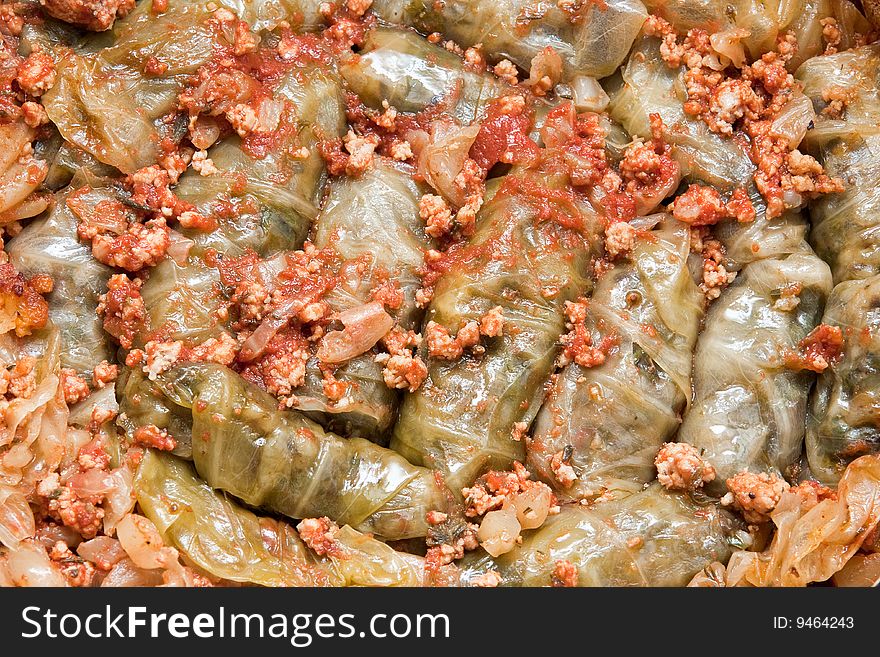 Cabbage suffed with beef sauted in olive oil with onions,herbs,rice and a light tomato sauce on top (sarmale in Romanian). Cabbage suffed with beef sauted in olive oil with onions,herbs,rice and a light tomato sauce on top (sarmale in Romanian)