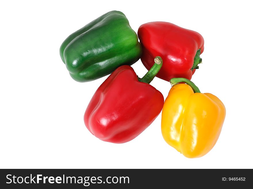 Isolated paprika in three colours on white background with clipping path