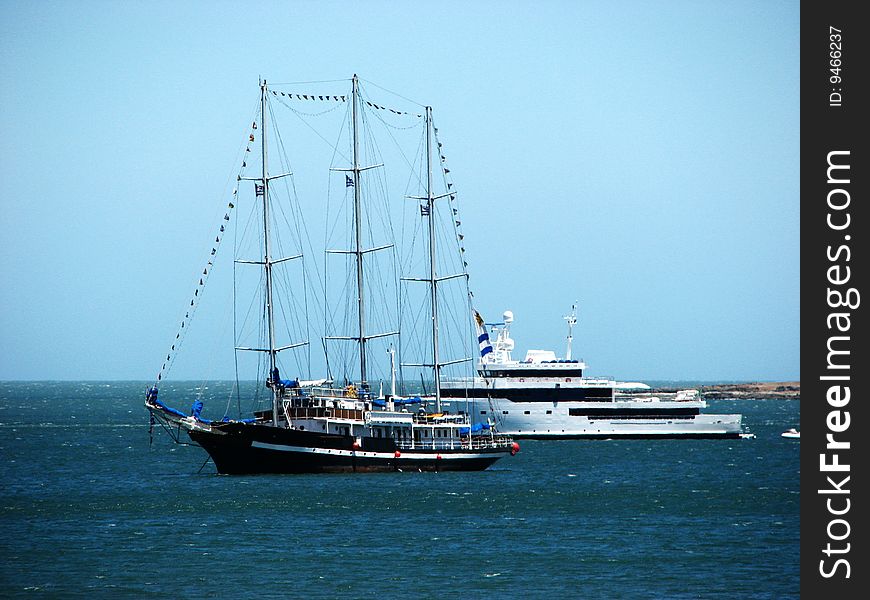 Modern and old ship in te sea. Modern and old ship in te sea