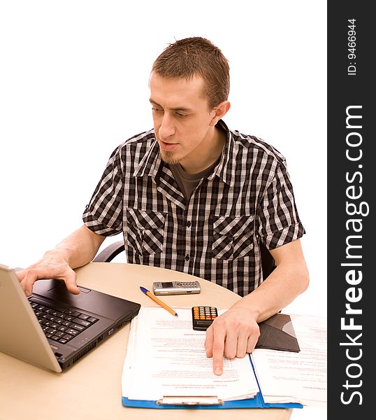 Man with phone working in office