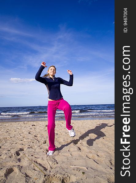 Active Woman On The Beach