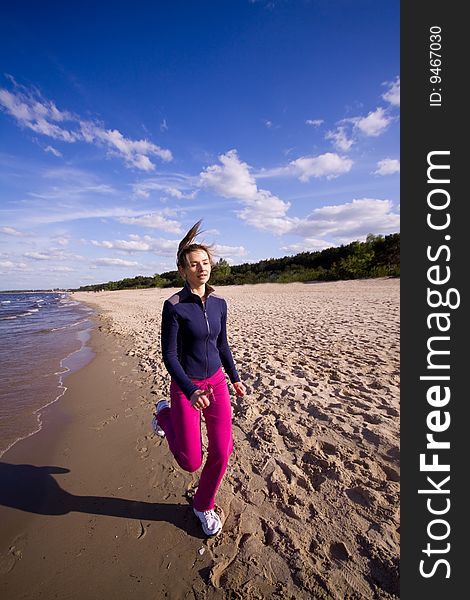 Active woman on the beach