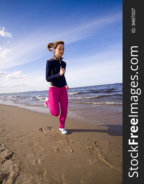 Active woman on the beach