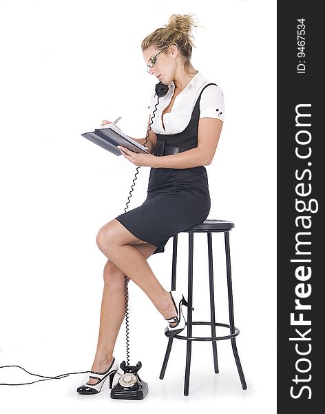 Beautiful blonde businees woman speaking by phone