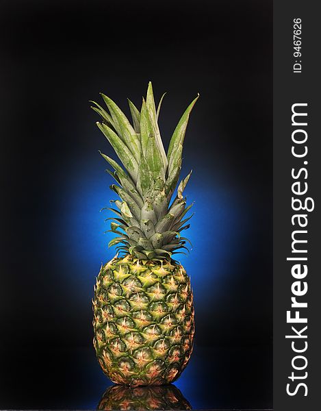 Pineapple on black background ready for your type.