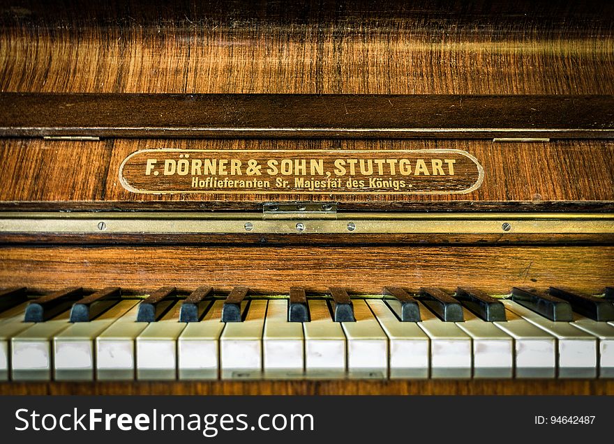 An antique piano close up.