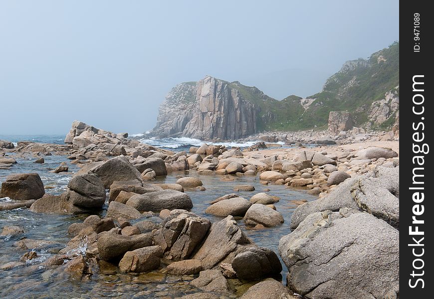 A landscape on rocky seacoast of Japanese sea. A landscape on rocky seacoast of Japanese sea.