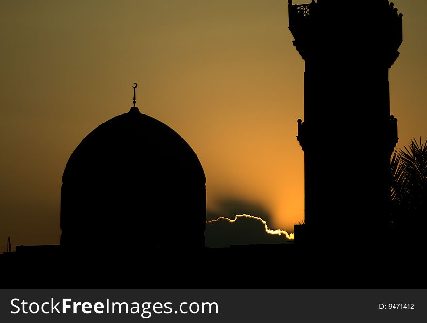 A mosque in downtown Dubai at sunset. A mosque in downtown Dubai at sunset