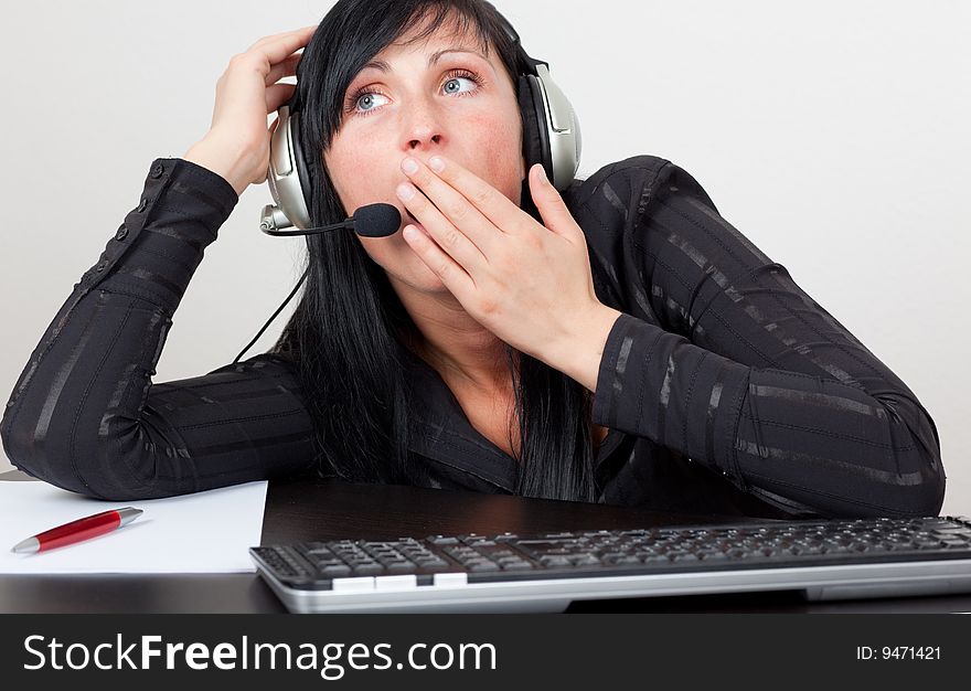 Callcenter agent beeing tired of work. Callcenter agent beeing tired of work