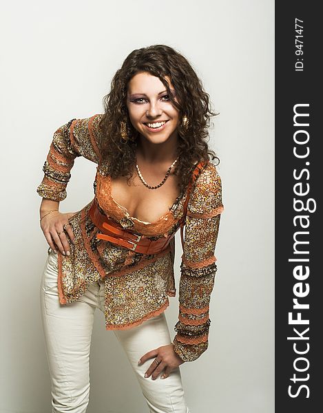 Portrait of young happy woman with long curly hair. Portrait of young happy woman with long curly hair.