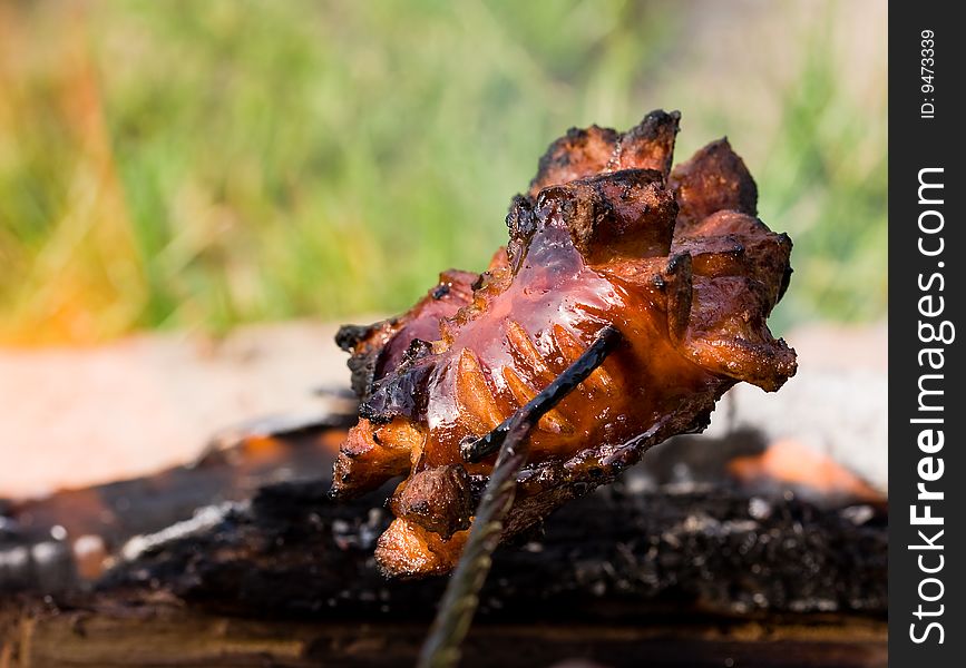 Sausages and chicken kebabs on a barbecue. Sausages and chicken kebabs on a barbecue