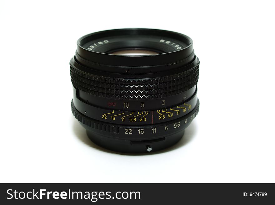 Old photo camera lens on white background