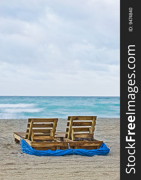 Beach chairs after sunrise during Miami Beach summer season. Beach chairs after sunrise during Miami Beach summer season