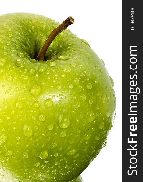 Green apple wizh water drops with white background