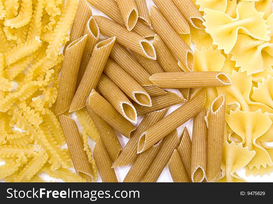 Different kinds of pasta isolated on white