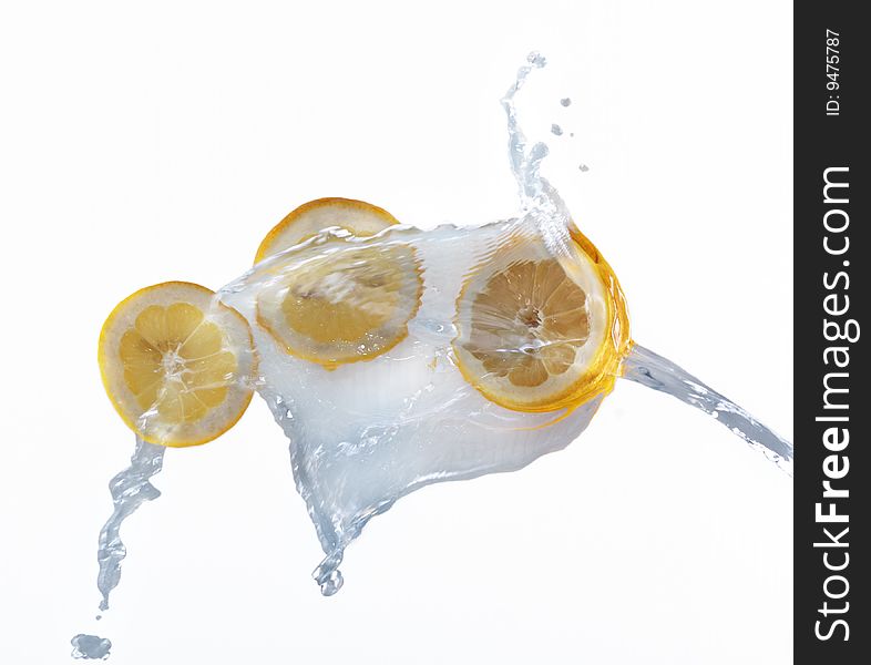 Lemon splash in water background